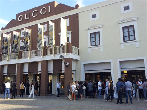 italy gucci outlet store|is gucci outlet worth it.